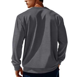 Rear view of men's charcoal grey long sleeve sweatshirt showing corduroy patchwork detail
