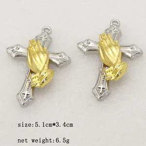 Silver and gold cross pendant with praying hands, size 5.1cm by 3.4cm, weight 6.5g