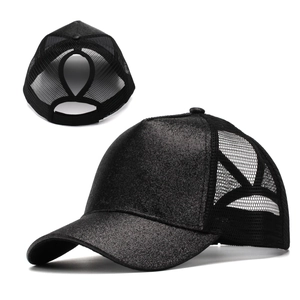 Detail of black glitter ponytail baseball cap with breathable mesh and back opening