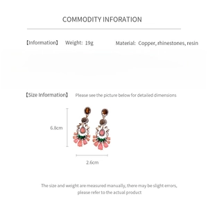 Detailed view of vintage flower drop earrings with size measurements 6.8cm and 2.6cm