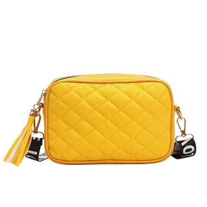 Bright yellow quilted crossbody bag with stylish long tassel and LOVE letter strap detail