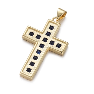 Detail of gold cross pendant with micro-pave square blue zircon gemstone inlay