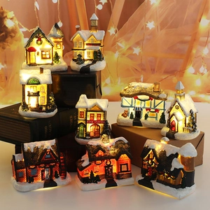 8-piece light-up resin Christmas village miniature houses with snow detail for holiday decor