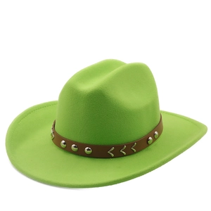 Detail of neon green wool fedora hat with brown leather band and silver studs