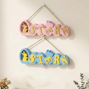 Close-up of Easter wall hangings featuring OSTERN text and rabbit motifs with jute rope