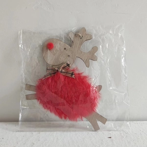 Detail of wooden Christmas elk ornament featuring red plush ball and checkered bow tie