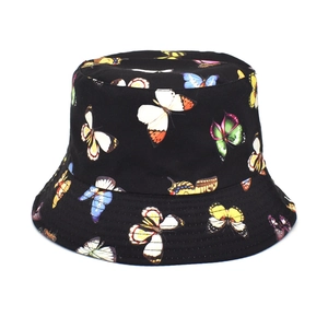 Detailed view of colorful butterfly patterns on a black canvas bucket hat with stitched brim