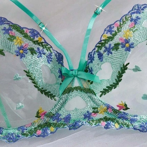 Mint green mesh lingerie set with floral embroidery and heart-shaped cutout detail