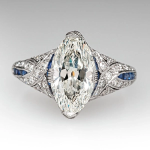 Art Deco marquise-cut diamond ring with blue sapphire accents in white gold finish