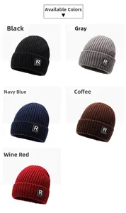 Detail of five winter beanies in black, grey, navy, coffee, and wine red with fashion labels