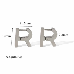 Silver R-shaped earring detail showing dimensions 11.5mm x 13mm and 3.2g weight