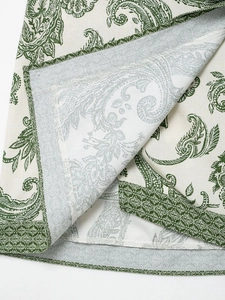 Detail of paisley print hem showing meticulous rolling seam and cotton-linen texture