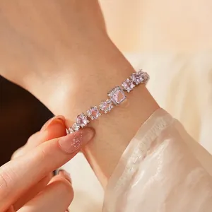 Sparkling pink zircon square charm bracelet in silver finish for a luxury fashion look