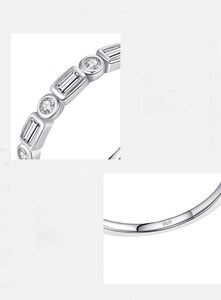 Macro detail of S925 sterling silver band with hand-set 5A cubic zirconia stones