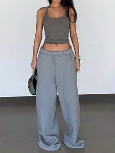 Women's athletic halter neck cropped tank top with light blue wide leg drawstring pants