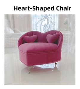 Detail of rose red heart-shaped velvet sofa jewelry box with vintage silver metal legs