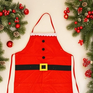 Festive Santa Claus apron for kitchen surrounded by pine branches and ornaments