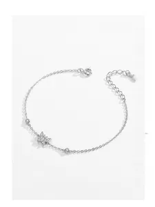 Detailed macro view of S925 sterling silver butterfly bracelet with small cubic zirconia