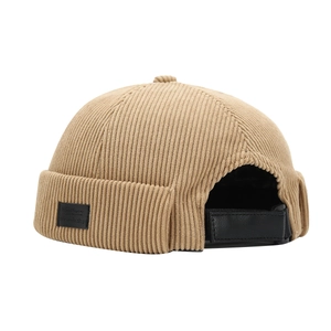 Khaki corduroy brimless docker hat with vintage texture and black leather strap