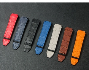 Macro shot of rubber-backed leather watch straps in multiple colors with crocodile texture