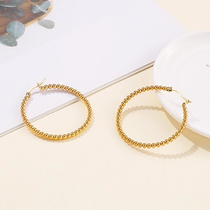 Chic golden beaded hoop earrings in polished stainless steel for women fashion style
