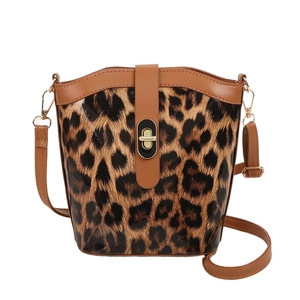 Stylish leopard print bucket bag for women with brown leather trim and gold twist lock