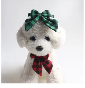 Close-up of red and green plaid bow tie pet collars in British style for small dogs and cats