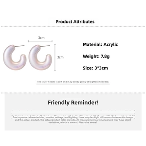 Detailed view of iridescent U-shaped acrylic earrings with dimensions 3x3cm and silver pins