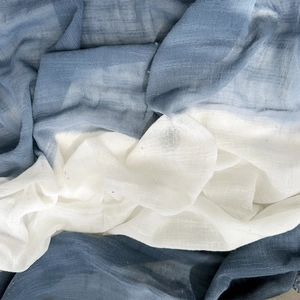 Minimalist blue and white gradient cotton linen scarf with soft breathable fabric texture