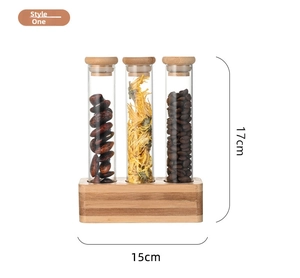Three-tube glass storage set with wooden stand and cork stoppers measuring 17cm high