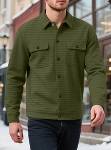 Outdoor shot of army green quilted long sleeve shirt jacket with check pattern texture