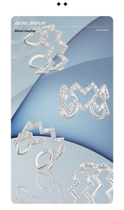 Detailed macro view of S925 sterling silver wavy ring with inlaid sparkling zircon stones