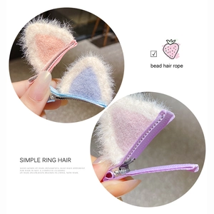 Cute plush 3D cat ear hair clips for girls in pink and purple colors on metal duckbill clips