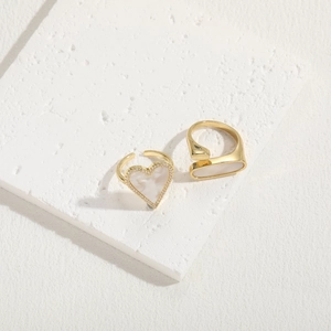 Adjustable gold rings with heart and oval shell stone settings and zircon accents