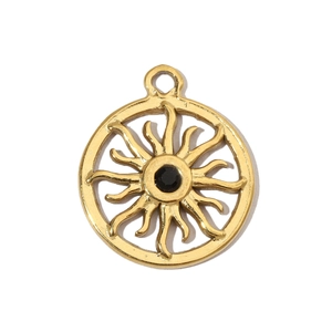 Macro shot of gold stainless steel sun pendant with a central black gemstone insert