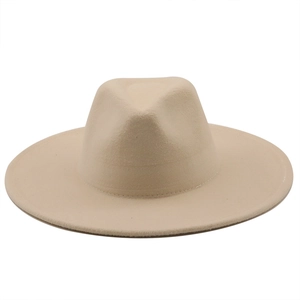 Detailed view of wide brim beige wool fedora hat with smooth felt texture and clean finish