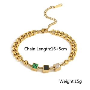 Detail of gold-tone stainless steel double chain with green, black, and white shell charms