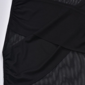 Detail of black mesh fabric with cross-wrap structure and side rushing texture
