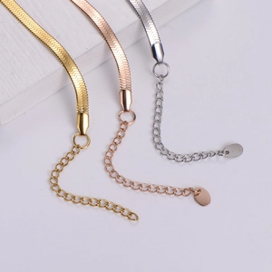 Sleek minimalist infinity snake chain bracelets in gold, rose gold, and silver finishes