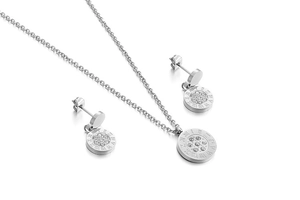 Detailed view of silver necklace and earrings set with roman numerals and crystals