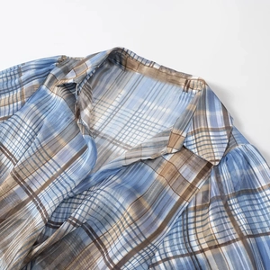 Sky blue and brown plaid long sleeve shirt with classic collar and subtle gold thread details