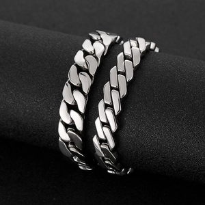 Polished silver stainless steel Cuban link bracelets for men in two different widths