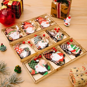 Set of 9 wooden Christmas gnome ornaments in a wooden box with festive holiday decor