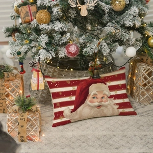 Detailed view of linen Christmas pillowcase with Santa print on plush grey rug