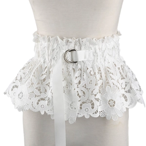 Detail of white floral lace corset belt with silver double D-ring buckle on a mannequin
