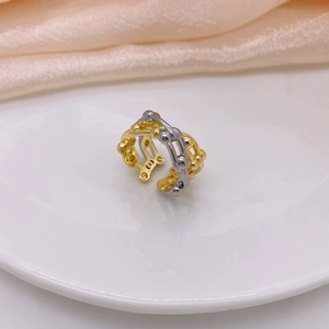 Two-tone interlocking link ring in 18K gold and silver plating with a modern woven design