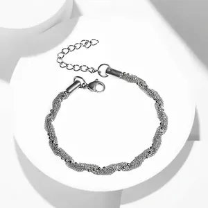 Silver woven mesh stainless steel bracelet with twisted texture and lobster clasp
