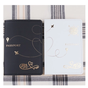 Matching Mr and Mrs PU leather passport covers with gold foil plane and heart patterns