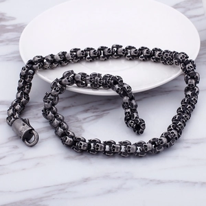 Close-up of vintage punk skull bracelet with oxidized stainless steel link details
