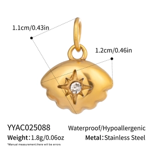 Detail of 18K gold stainless steel shell pendant with starburst cubic zirconia
